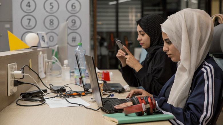 Palestinian entrepreneurs working in a shared space in Ramallah